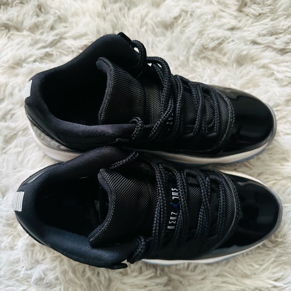 Air Jordan 11 Retro Low black/Varsity Royal. Size 3.5 slightly used